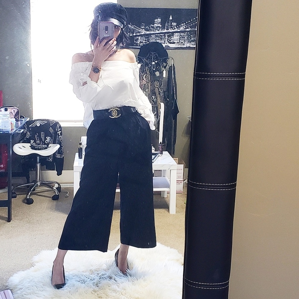 Jumpsuit with open back and wide leg trousers